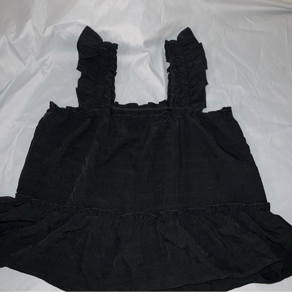 3/10….Black Ruffled Sleeveless Top